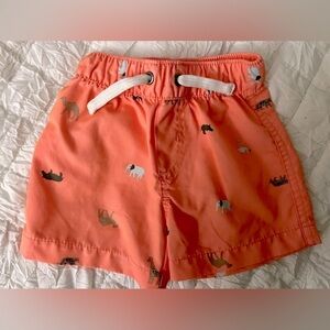 9m kid swim trunks. Orange with little wild animals. Functional drawstring